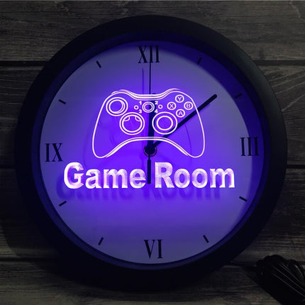 Lysende LED-veggklokke for gamer-rom