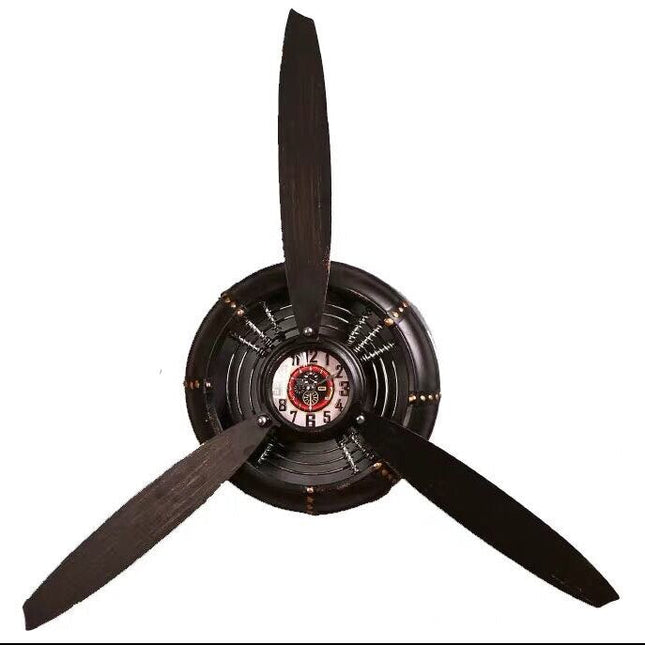 Retro veggklokke designet som flypropell