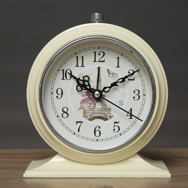 Rund retro vekkerklokke med blomster
