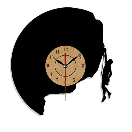 Veggklokke i vinyl med klatremotiv