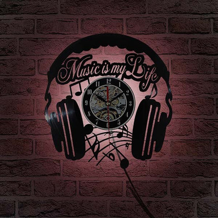 Vinylklokke med hodetelefoner for DJ