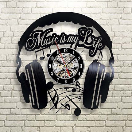 Vinylklokke med hodetelefoner for DJ