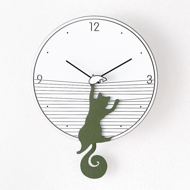 Veggklokke med klatrende katt design