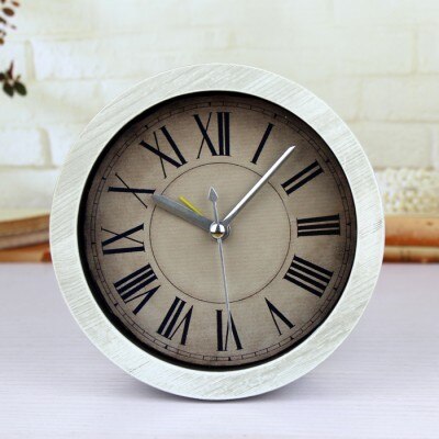 Liten rund vintage bordklokke med romertall