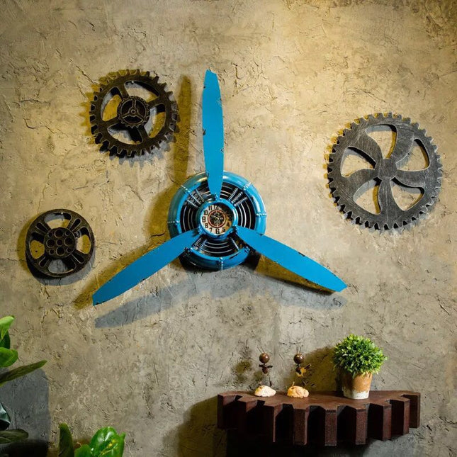 Retro veggklokke designet som flypropell