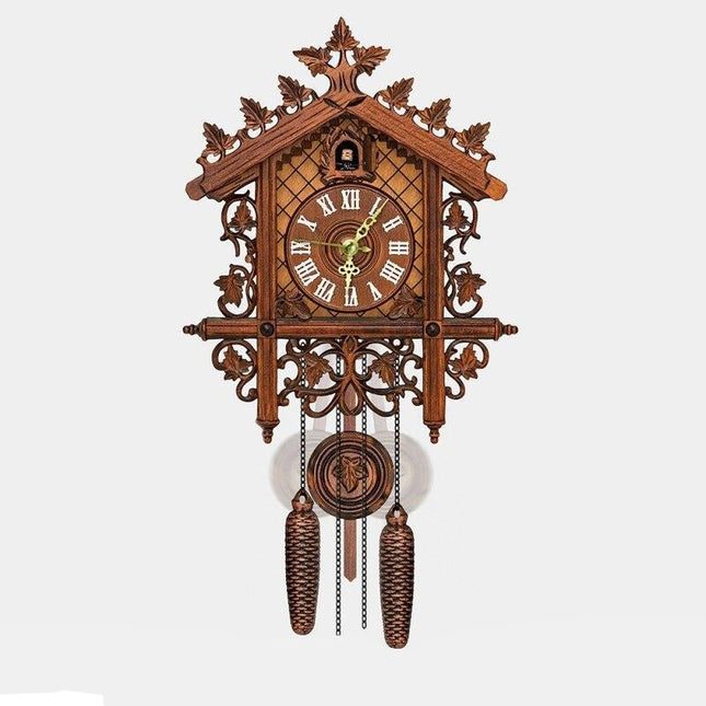 Utskåret gjøkur i mørkt tre