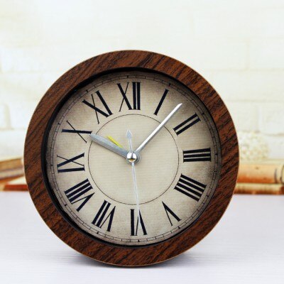 Liten rund vintage bordklokke med romertall