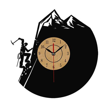 Veggklokke i vinyl med klatremotiv