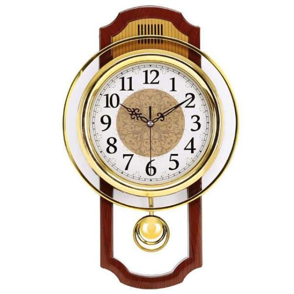 Klassisk pendelklokke i gullfarge