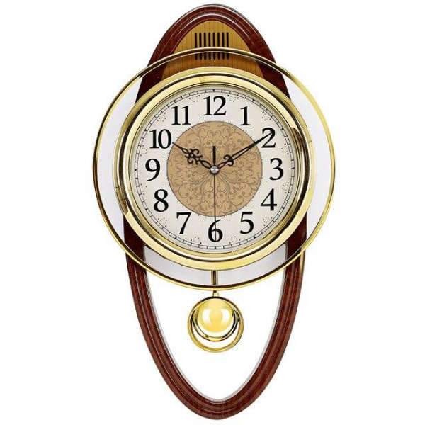 Klassisk pendelklokke i gullfarge