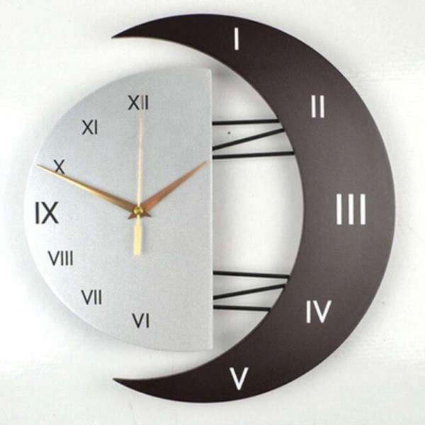 Veggklokke formet som måne og stjerne