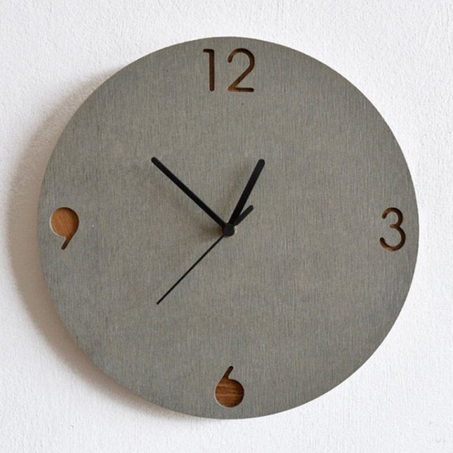 Minimalistisk veggklokke i grå betonglook