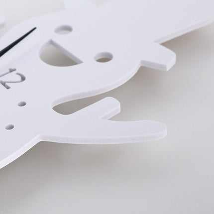 Barneklokke formet som en snømann