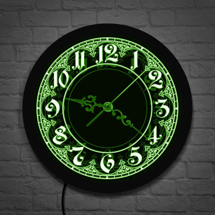 Veggklokke med LED-lys i arabisk design