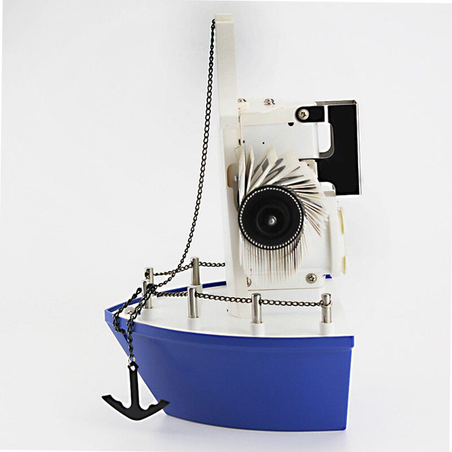 Flip-klokke formet som en seilbåt