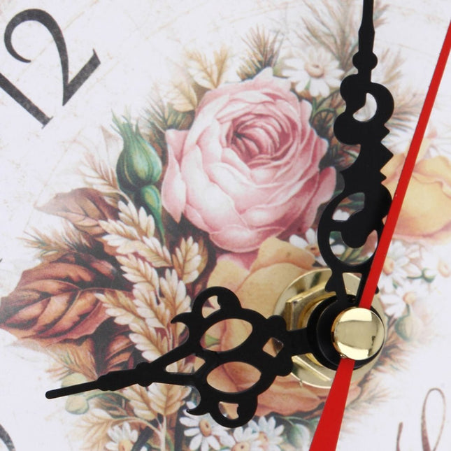 Vintage veggklokke i tre med blomster