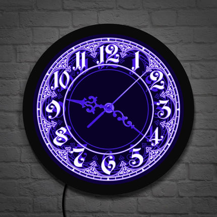 Veggklokke med LED-lys i arabisk design