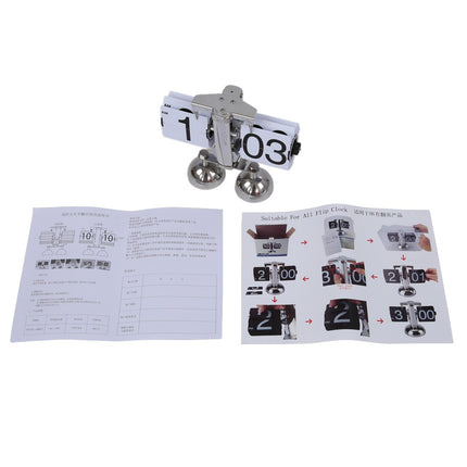 Vintage automatisk flippeklokke i stål