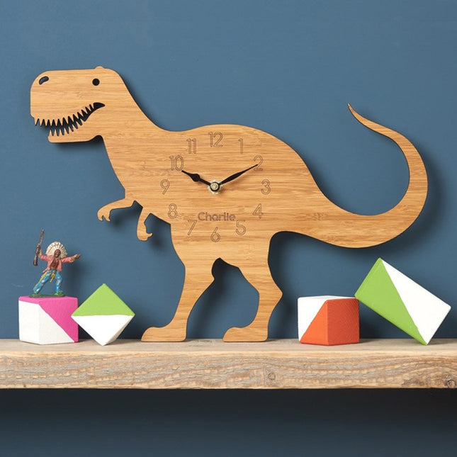 Veggklokke for barnerom formet som dinosaur