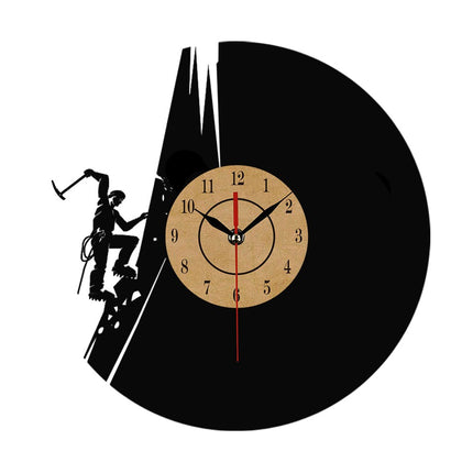 Veggklokke i vinyl med klatremotiv