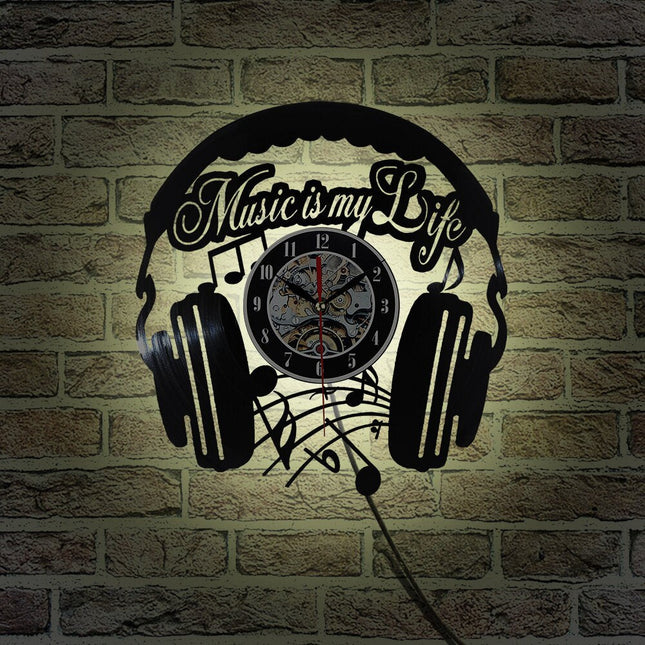 Vinylklokke med hodetelefoner for DJ