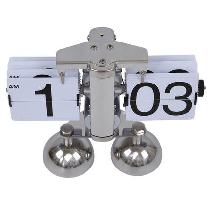 Vintage automatisk flippeklokke i stål