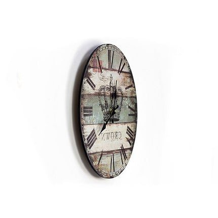 Rund vintage veggklokke med kronemotiv