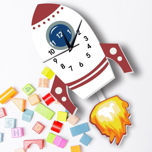 Barneveggklokke formet som en rakett