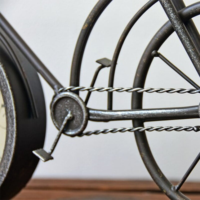 Dekorativ vintage bordklokke formet som sykkel