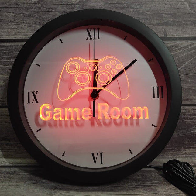 Lysende LED-veggklokke for gamer-rom