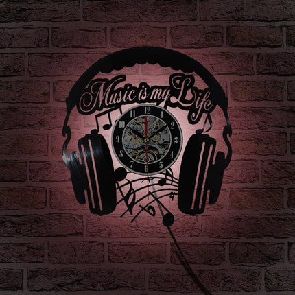 Vinylklokke med hodetelefoner for DJ