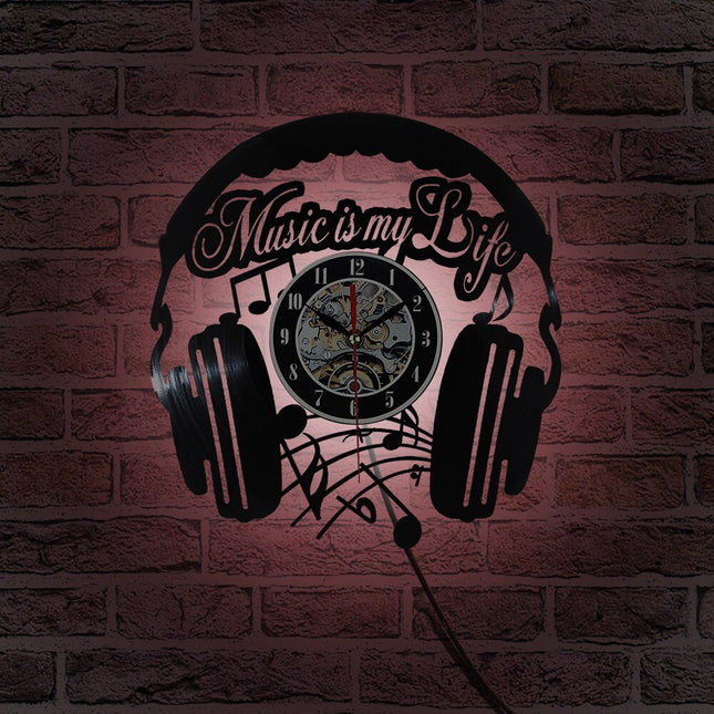 Vinylklokke med hodetelefoner for DJ
