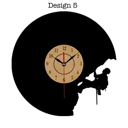 Veggklokke i vinyl med klatremotiv