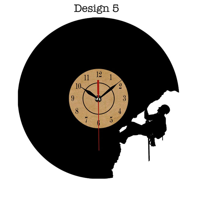 Veggklokke i vinyl med klatremotiv