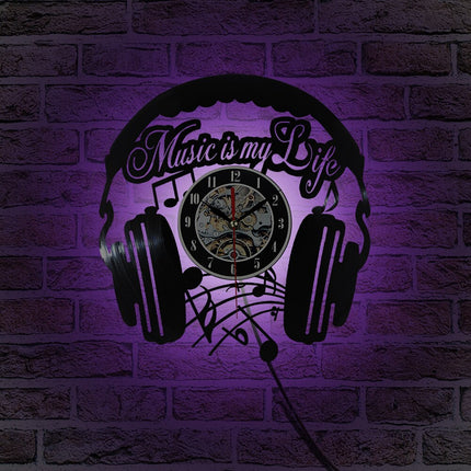 Vinylklokke med hodetelefoner for DJ