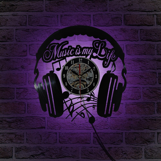Vinylklokke med hodetelefoner for DJ