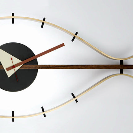 Design veggklokke formet som et øye