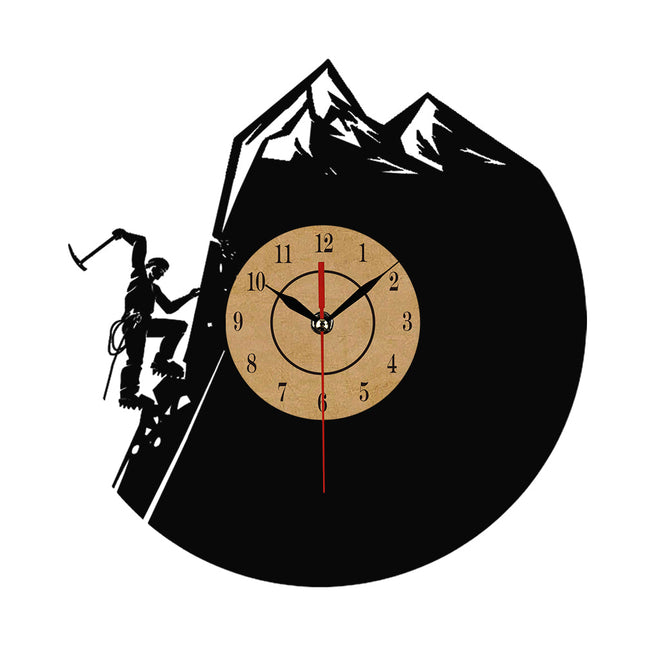 Veggklokke i vinyl med klatremotiv