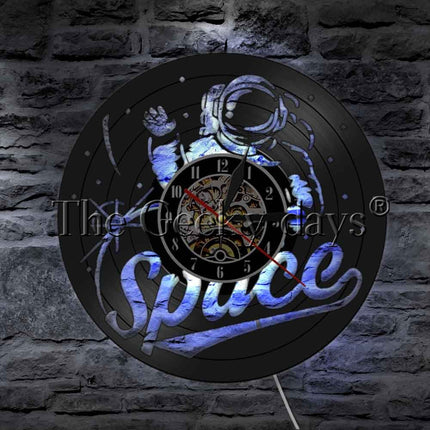 Vinylklokke med astronaut i verdensrommet