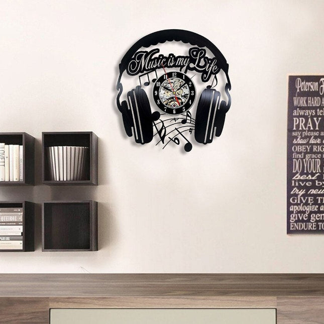 Vinylklokke med hodetelefoner for DJ