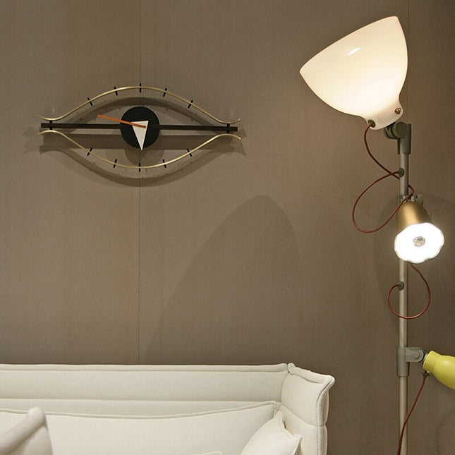 Design veggklokke formet som et øye