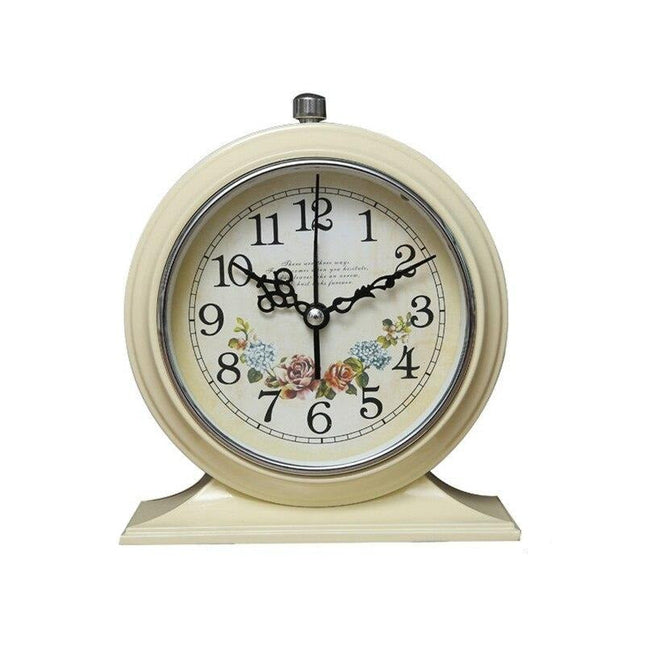 Rund retro vekkerklokke med blomster