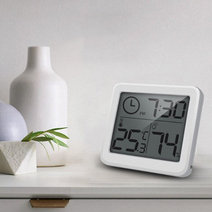 Hvit digital klokke med termometer