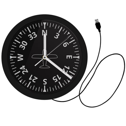 Lysende veggklokke med flyinstrument design