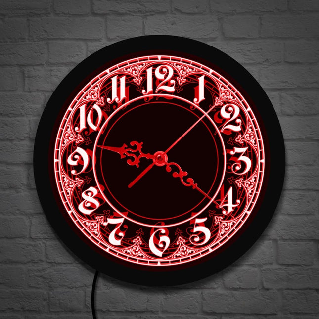 Veggklokke med LED-lys i arabisk design