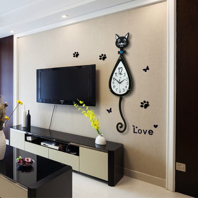 Pendelklokke formet som en svart katt