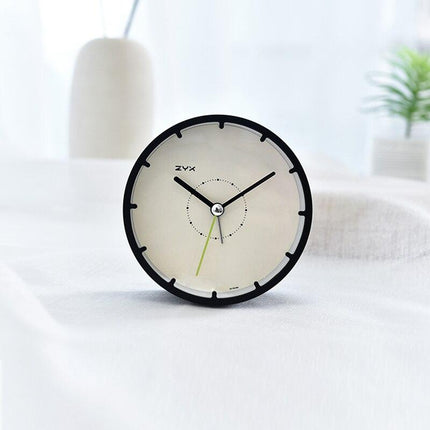 Minimalistisk rund klokke uten tall