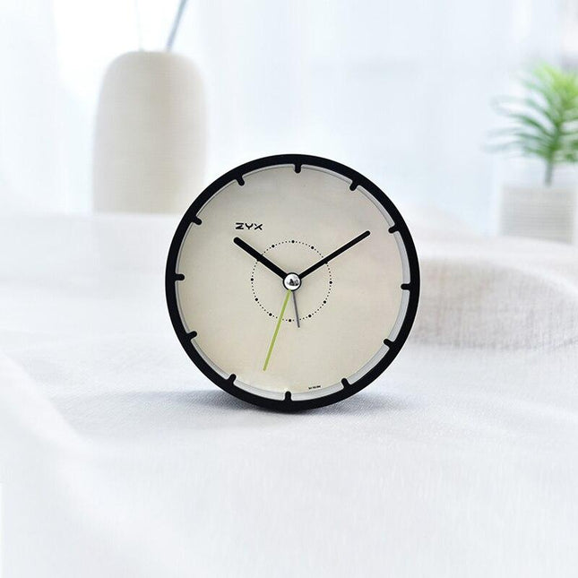 Minimalistisk rund klokke uten tall