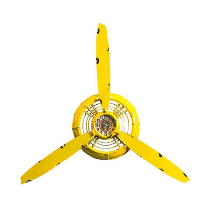 Veggklokke formet som en gammel flypropell