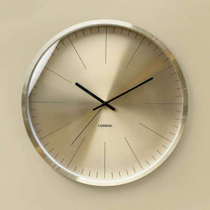 Stor minimalistisk veggklokke i gull